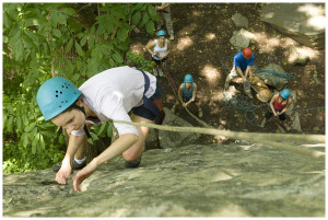 Woman rock climbing at Carederock Park, Maryland